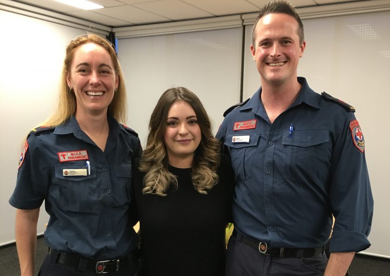 Female patient reuniting with female and male paramedic