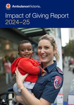 AV Impact of Giving Report front cover image of a paramedic holding a baby