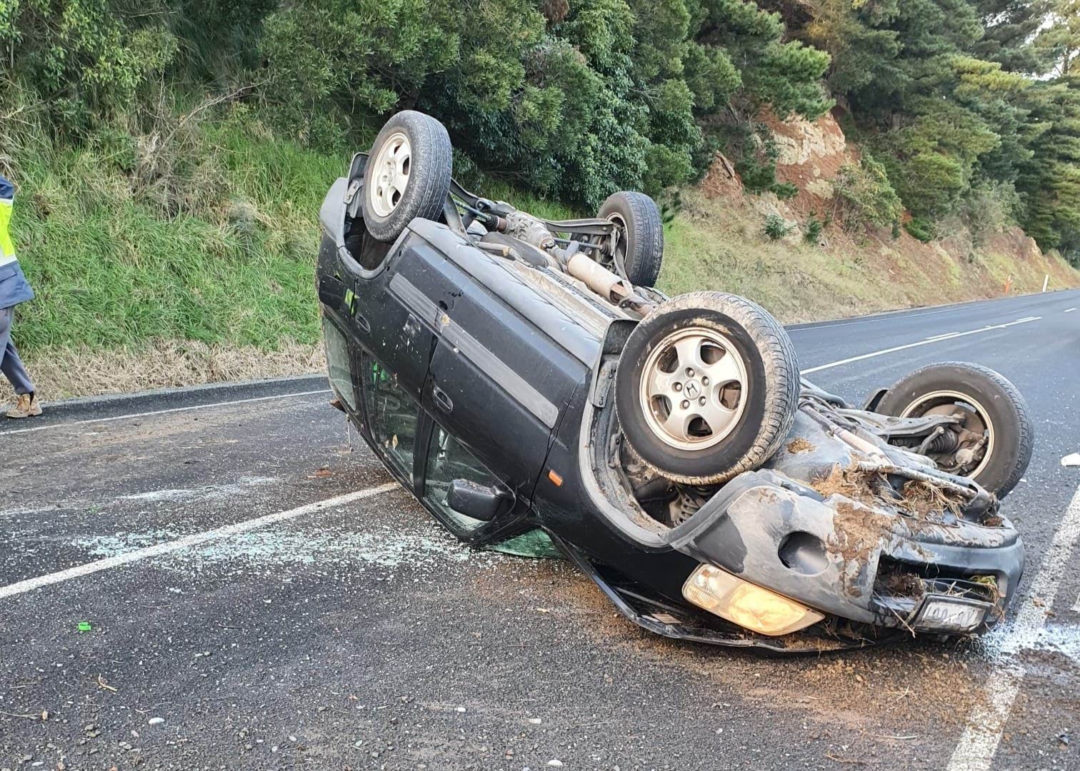 A car rolled over on the road.