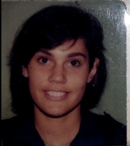 Photo of a smiling woman. 