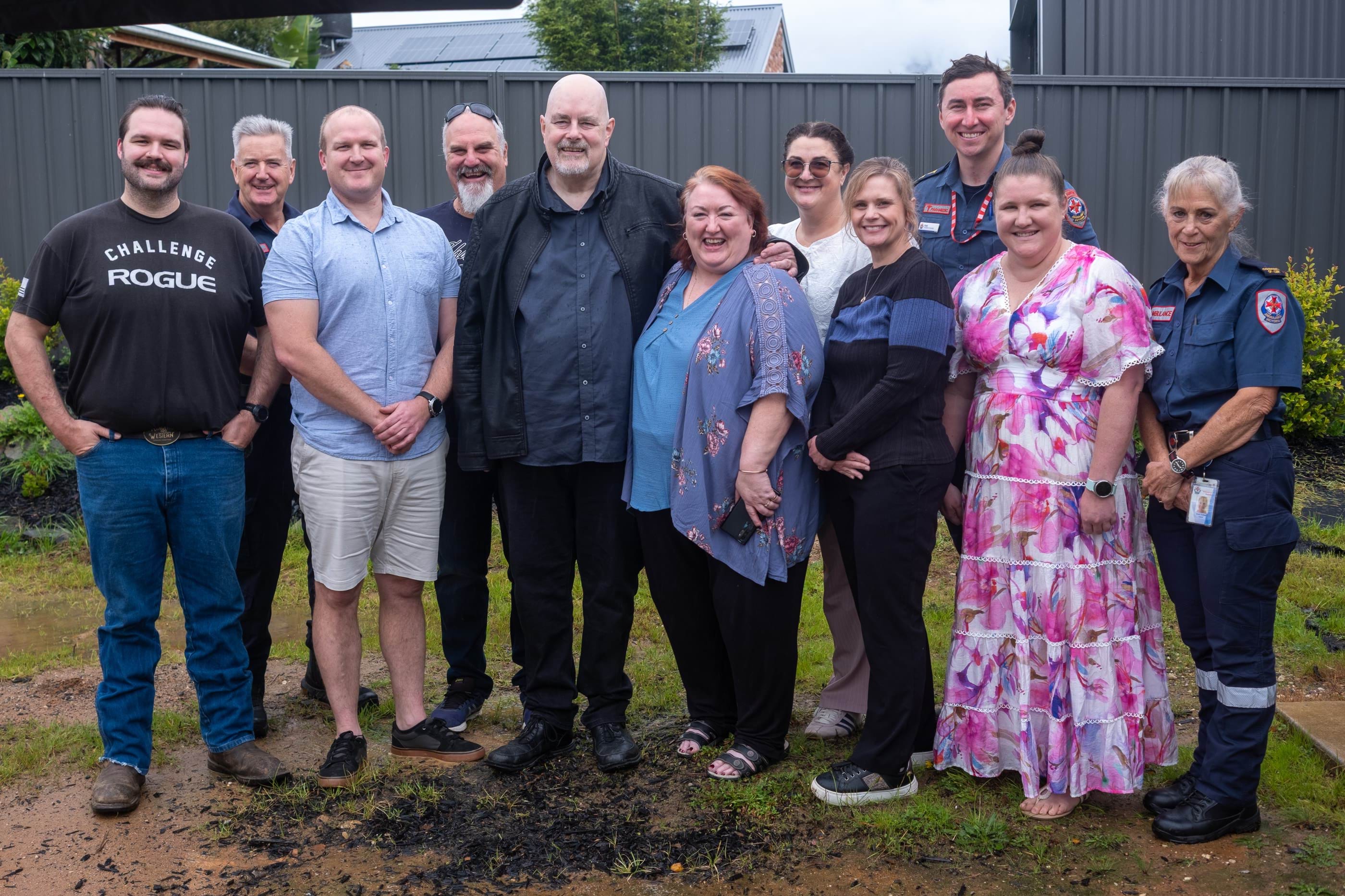 Colin with the paramedics, GoodSAM responders and bystanders who saved his life