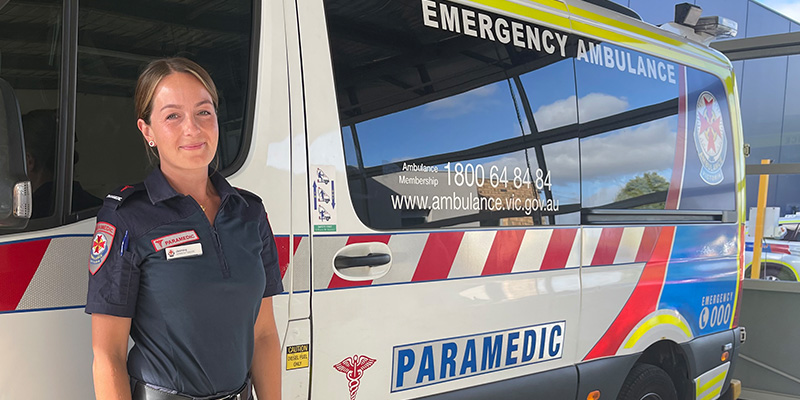 Ambulance Victoria paramedic Jasmina Pedic standing beside an ambulance and recounting how she lost her father in a rock fishing experience in 2006.